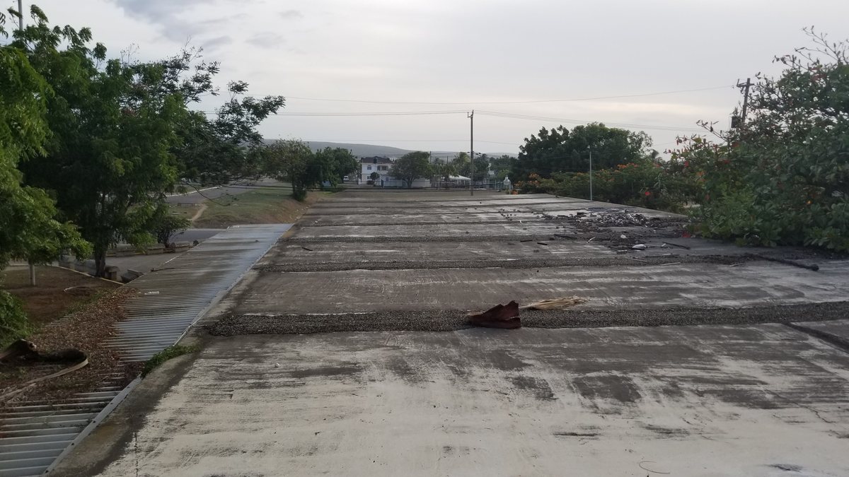 Concrete roof before waterproofing — weathered and stained