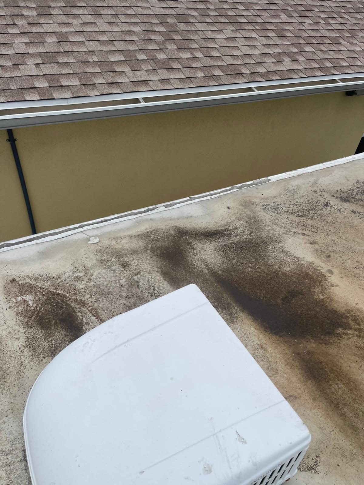 Pressure washing a roof